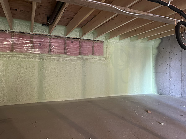Rim Joists and concrete walls sprayed with closed cell polyurethane foam. Vancouver Island. Victoria.